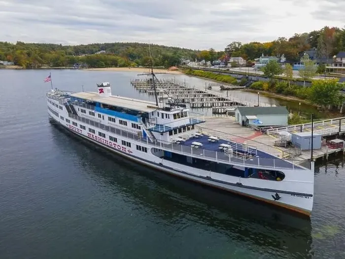 Framed Print : MS Mount Washington cruise ship docked at Weirs Beach port on Lake Winnipesaukee with fall foliage in City of Laconia