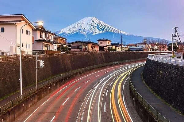 Mt. Fuji, Japan over neighborhoods and highways