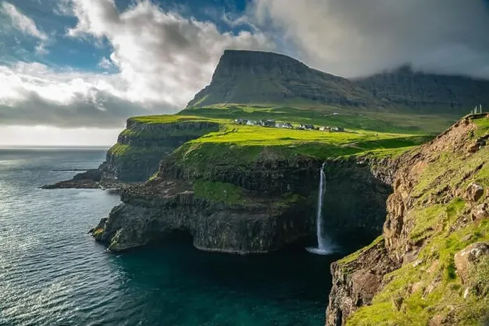 Framed Print : Mulafossur waterfall in Gasadalur at dusk, Vagar, Faroe Islands Framed Print : Mulafossur waterfall in Gasadalur at dusk, Vagar, Faroe Islands