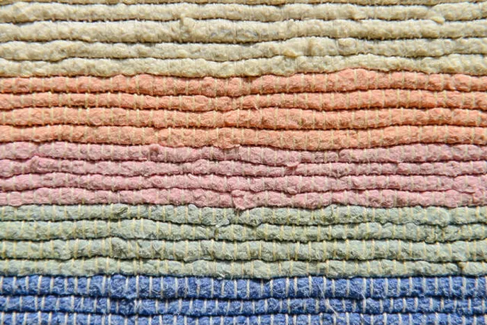 Framed Print : Multicolor fabric texture. Handmade traditional Thailand carpet Framed Print : Multicolor fabric texture. Handmade traditional Thailand carpet