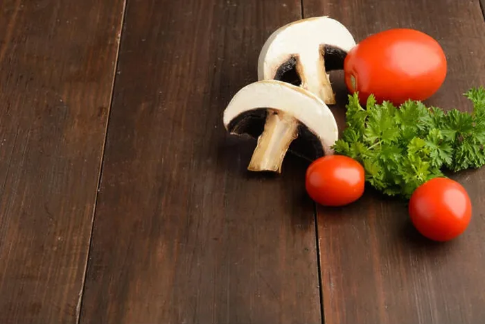 Framed Print : Mushrooms, tomatoes and parsley, ingredients for pizza or another cooking over wooden table Framed Print : Mushrooms, tomatoes and parsley, ingredients for pizza or another cooking over wooden table