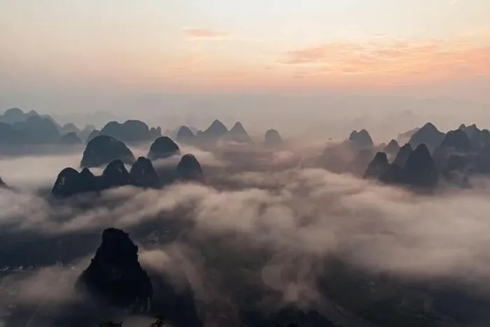Framed Print : Mysterious river landscape among high mountains in haze Framed Print : Mysterious river landscape among high mountains in haze