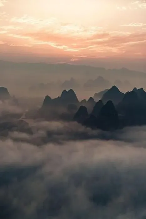 Framed Print : Mysterious river landscape among high mountains in haze Framed Print : Mysterious river landscape among high mountains in haze