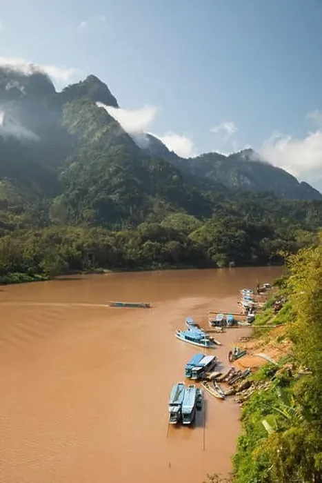 Framed Print : Nam Ou River with karst peaks and lifting mist Framed Print : Nam Ou River with karst peaks and lifting mist