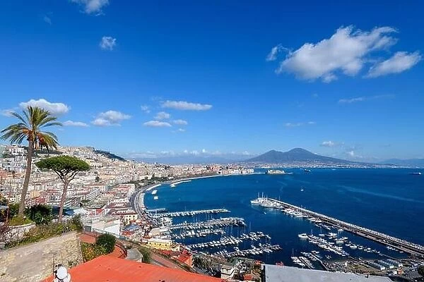 Naples, Italy aerial skyline on the bay with Mt. Vesuvius in the day