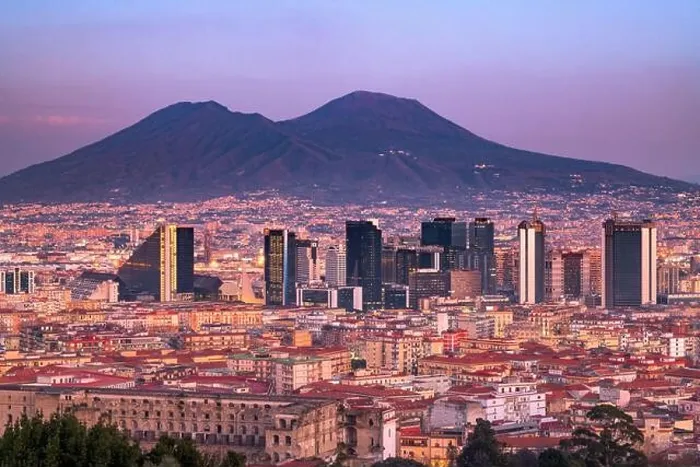 Framed Print : Naples, Italy with the financial district skyline under Mt. Vesuvius at twilight Framed Print : Naples, Italy with the financial district skyline under Mt. Vesuvius at twilight
