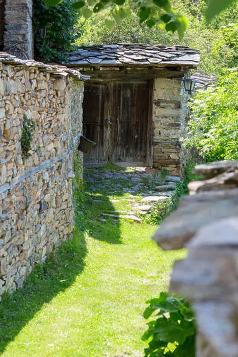 Framed Print : Narrow street covered with grass between old stone walls Framed Print : Narrow street covered with grass between old stone walls