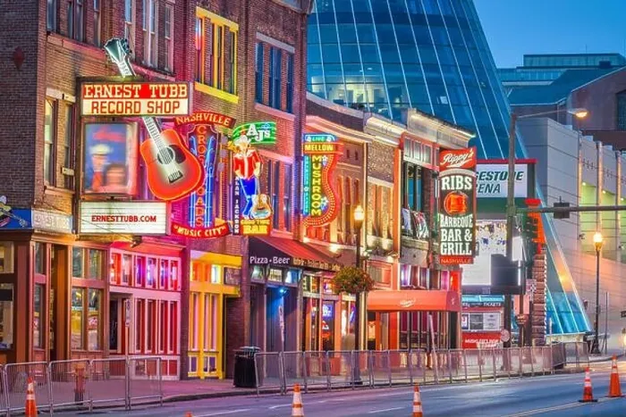 Framed Print : NASHVILLE, TENNESSEE - AUGUST 20, 2018: Honky-tonks on Lower Broadway. The district is famous for the numerous country music entertainment establishme Framed Print : NASHVILLE, TENNESSEE - AUGUST 20, 2018: Honky-tonks on Lower Broadway. The district is famous for the numerous country music entertainment establishme