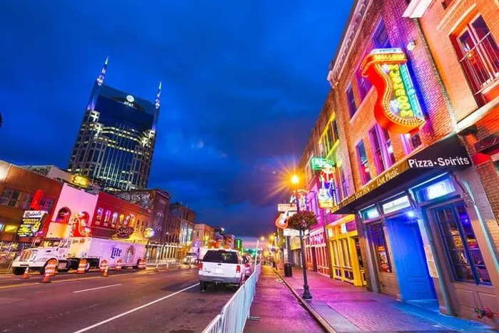 Framed Print : NASHVILLE, TENNESSEE - AUGUST 20, 2018: Honky-tonks on Lower Broadway. The district is famous for the numerous country music entertainment establishme Framed Print : NASHVILLE, TENNESSEE - AUGUST 20, 2018: Honky-tonks on Lower Broadway. The district is famous for the numerous country music entertainment establishme