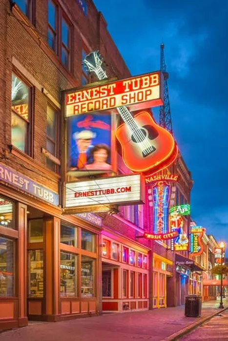 Framed Print : NASHVILLE, TENNESSEE - AUGUST 20, 2018: Honky-tonks on Lower Broadway. The district is famous for the numerous country music entertainment establishme Framed Print : NASHVILLE, TENNESSEE - AUGUST 20, 2018: Honky-tonks on Lower Broadway. The district is famous for the numerous country music entertainment establishme