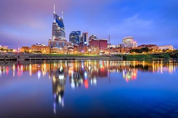 Nashville, Tennessee, USA skyline on the Cumberland River at night