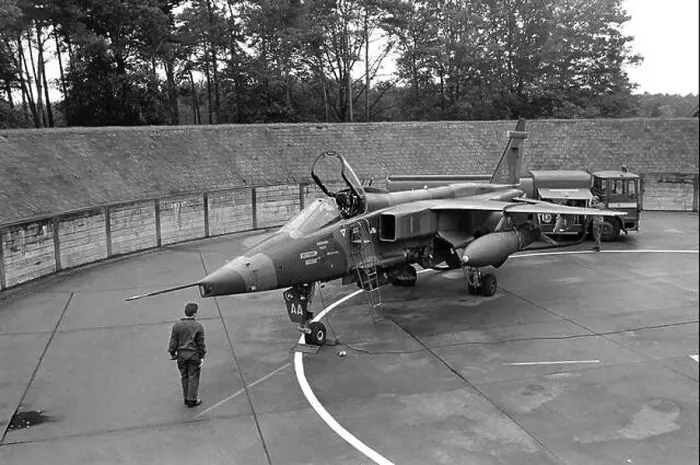 Framed Print : NATO in Germany, British SEPECAT Jaguar strike aircraft in its armored shelter at RAF Bruggen air base (September 1984) Framed Print : NATO in Germany, British SEPECAT Jaguar strike aircraft in its armored shelter at RAF Bruggen air base (September 1984)