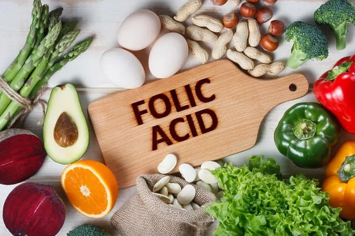 Framed Print : Natural sources of folic acid as asparagus, broccoli, eggs, salad, avocado, paprika, nuts, orange, beetroots and beans Framed Print : Natural sources of folic acid as asparagus, broccoli, eggs, salad, avocado, paprika, nuts, orange, beetroots and beans