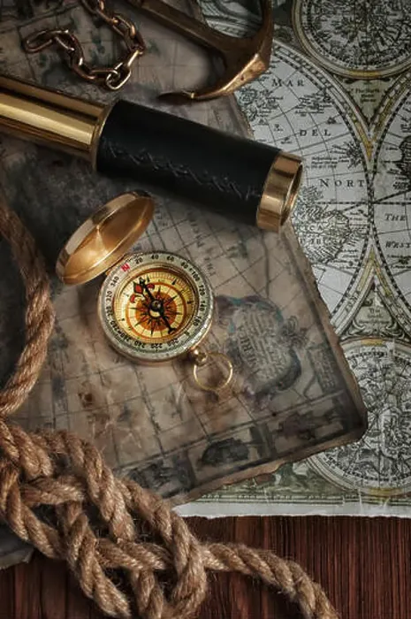 Framed Print : Nautical background with a navigation tools: telescope, compass and old map Framed Print : Nautical background with a navigation tools: telescope, compass and old map