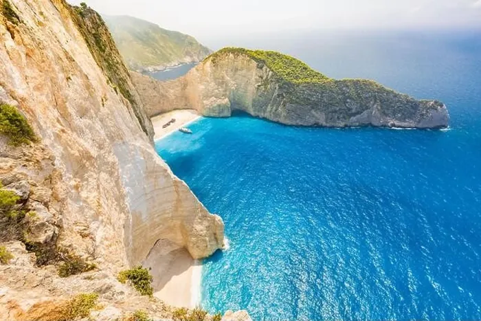 Framed Print : Navagio bay and Ship Wreck beach in summer. The most famous natural landmark of Zakynthos, Greek island in the Ionian Sea Framed Print : Navagio bay and Ship Wreck beach in summer. The most famous natural landmark of Zakynthos, Greek island in the Ionian Sea