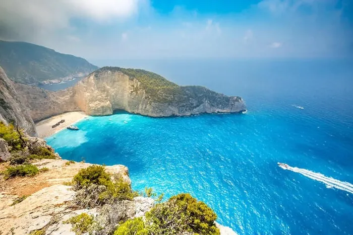 Framed Print : Navagio bay and Ship Wreck beach in summer. The most famous natural landmark of Zakynthos, Greek island in the Ionian Sea Framed Print : Navagio bay and Ship Wreck beach in summer. The most famous natural landmark of Zakynthos, Greek island in the Ionian Sea