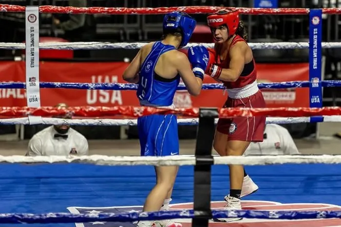 Framed Print : Nelda Ibarra (red) and Emma Nayanet (blue) fight during the Olympic Boxing Trials Framed Print : Nelda Ibarra (red) and Emma Nayanet (blue) fight during the Olympic Boxing Trials