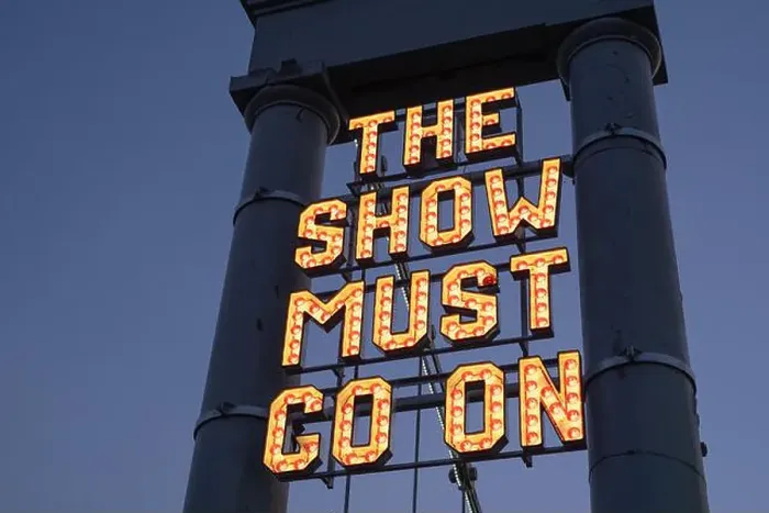 Framed Print : Neon sign The Show Must Go On installed by The Stove Network over the Dumfries Suspension Bridge Framed Print : Neon sign The Show Must Go On installed by The Stove Network over the Dumfries Suspension Bridge