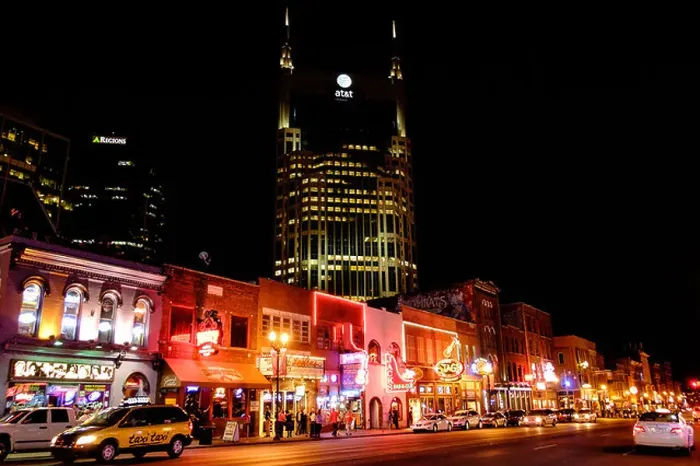 Framed Print : Neon signs illuminate Broadway Street at night in Downtown Nashville, Tennessee Framed Print : Neon signs illuminate Broadway Street at night in Downtown Nashville, Tennessee