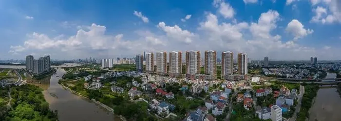 Framed Print : new luxury housing development of eight high rise towers located on a river in southest asia Framed Print : new luxury housing development of eight high rise towers located on a river in southest asia