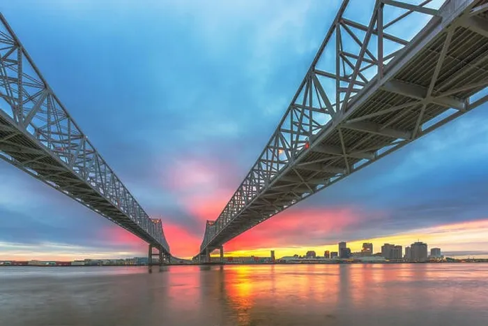 Framed Print : New Orleans, Louisiana, USA downtown skyline on the Mississippi River below the Crescent City Connection Bridge Framed Print : New Orleans, Louisiana, USA downtown skyline on the Mississippi River below the Crescent City Connection Bridge