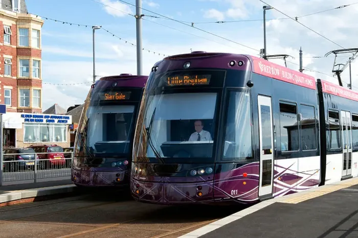 Framed Print : Two new style Blackpool trams pass each other in a station on the seafront in Blackpool, Lancashire Framed Print : Two new style Blackpool trams pass each other in a station on the seafront in Blackpool, Lancashire