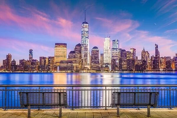 New York City financial district on the Hudson River at twilight