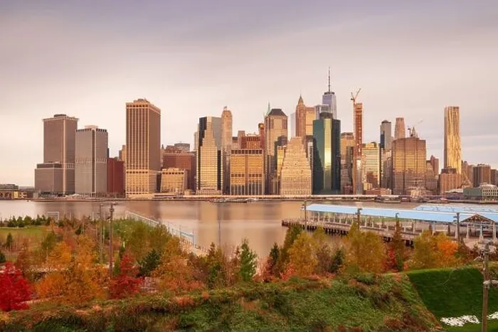 Framed Print : New York City skyline from across the East River with autumn seasonal foliage Framed Print : New York City skyline from across the East River with autumn seasonal foliage