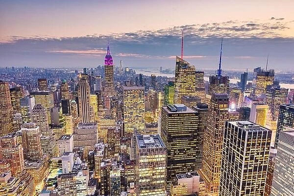 New York City, USA midtown Manhattan financial district cityscape at dusk