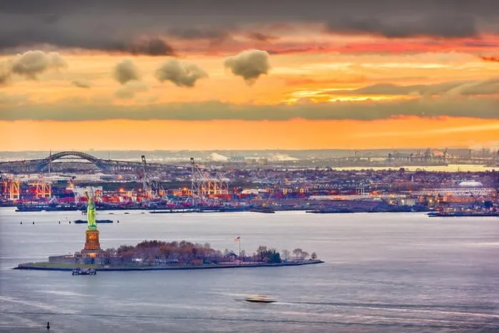 Framed Print : New York Harbor, New York, USA with the Statue of Liberty and Bayonne, New Jersey in the background Framed Print : New York Harbor, New York, USA with the Statue of Liberty and Bayonne, New Jersey in the background