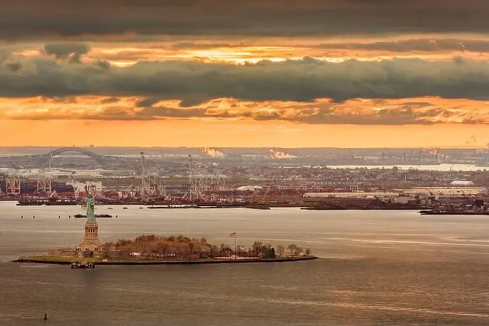 Framed Print : New York Harbor, New York, USA with the statue of liberty and Bayonne, New Jersey in the background Framed Print : New York Harbor, New York, USA with the statue of liberty and Bayonne, New Jersey in the background