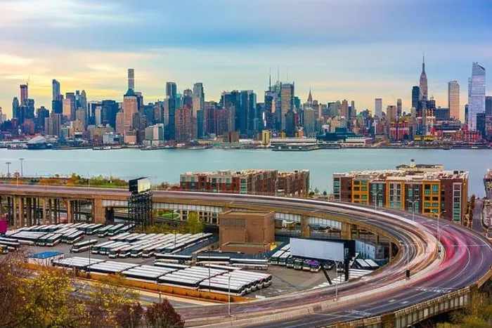 Framed Print : New York, New York, USA cityscape and highways from across the Hudson River at dusk Framed Print : New York, New York, USA cityscape and highways from across the Hudson River at dusk