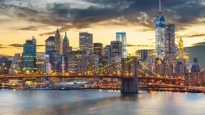 Framed Print : New York, New York, USA downtown Manhattan city skyline over the East River with the Brooklyn Bridge at dusk Framed Print : New York, New York, USA downtown Manhattan city skyline over the East River with the Brooklyn Bridge at dusk