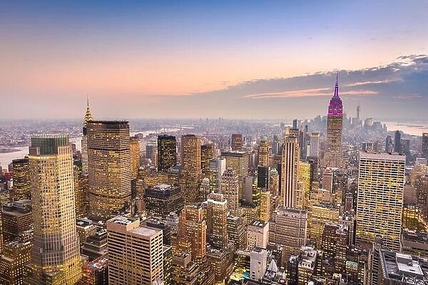 New York, New York, USA downtown skyline over manhattan at dusk