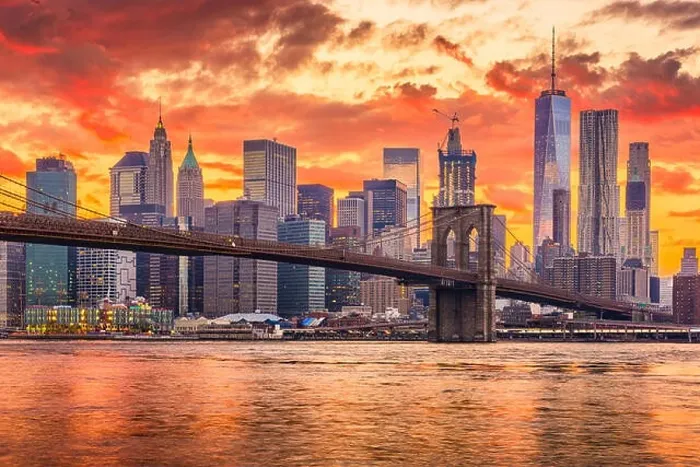 Framed Print : New York, New York, USA skyline of Manhattan on the East River with Brooklyn Bridge after sunset Framed Print : New York, New York, USA skyline of Manhattan on the East River with Brooklyn Bridge after sunset