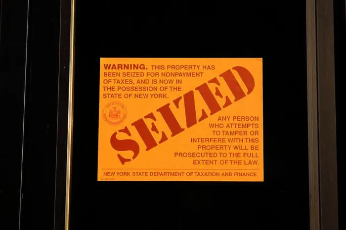 Framed Print : A New York State Department of Taxation and Finance Seized sticker for the nonpayment of taxes (tax lien) Framed Print : A New York State Department of Taxation and Finance Seized sticker for the nonpayment of taxes (tax lien)