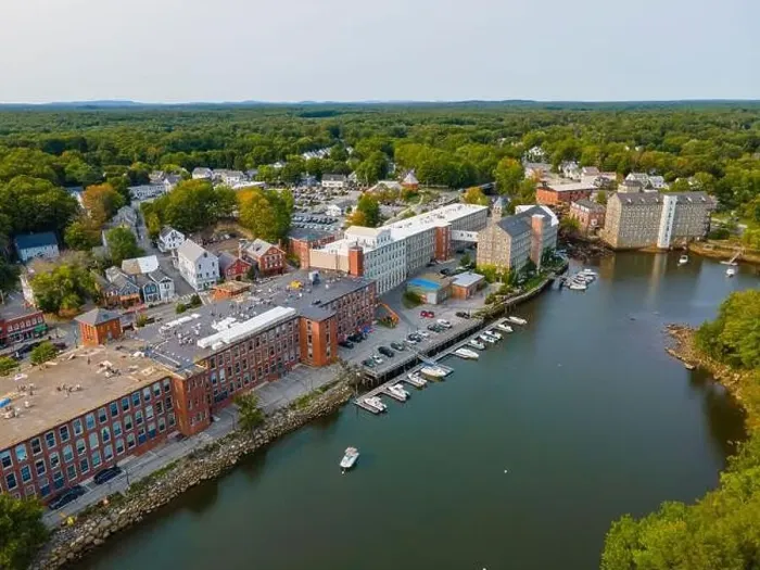 Framed Print : Newmarket Mills building aerial view on Lamprey River on Main Street in historic town center of Newmarket Framed Print : Newmarket Mills building aerial view on Lamprey River on Main Street in historic town center of Newmarket
