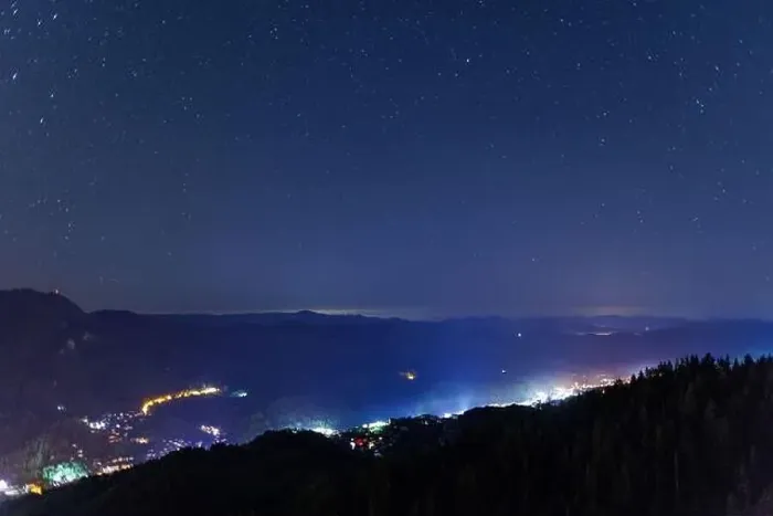 Framed Print : Night intermountain city of Smolyan with bright evening electric lights under a clear sky with bright small stars Framed Print : Night intermountain city of Smolyan with bright evening electric lights under a clear sky with bright small stars