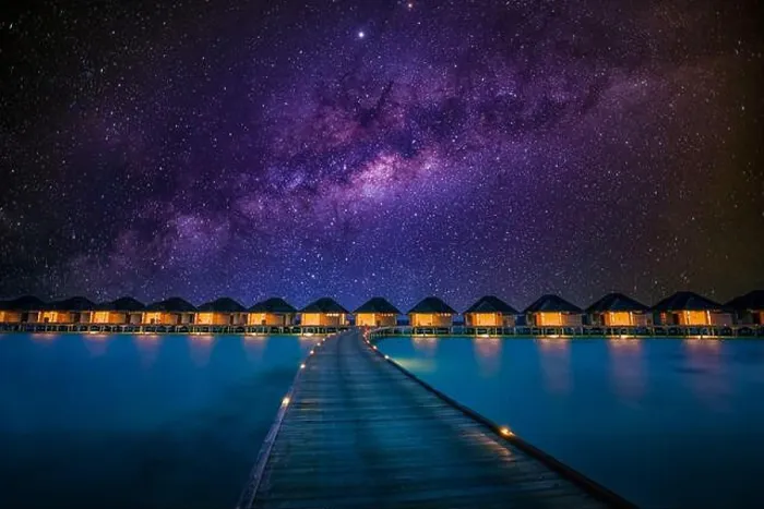 Framed Print : Night time long exposure landscape, over water villas in Maldives. Amazing sunset panorama at Maldives. Luxury resort villas seascape Framed Print : Night time long exposure landscape, over water villas in Maldives. Amazing sunset panorama at Maldives. Luxury resort villas seascape