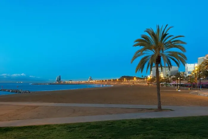 Framed Print : Night view of Barceloneta Beach in Barcelona with colorful sky at night. Seafront, beach, coast in Spain. Suburb of Barcelona, Catalonia Framed Print : Night view of Barceloneta Beach in Barcelona with colorful sky at night. Seafront, beach, coast in Spain. Suburb of Barcelona, Catalonia