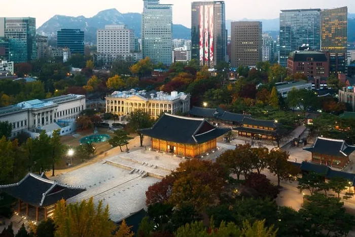 Framed Print : Night view of Deoksugung Palace and Seoul city in autumn season in Seoul, South Korea Framed Print : Night view of Deoksugung Palace and Seoul city in autumn season in Seoul, South Korea