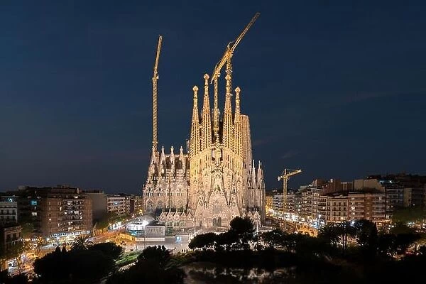 Night view of the Sagrada Familia, a large Roman Catholic church in Barcelona, Spain, designed by Catalan architect Antoni Gaudi