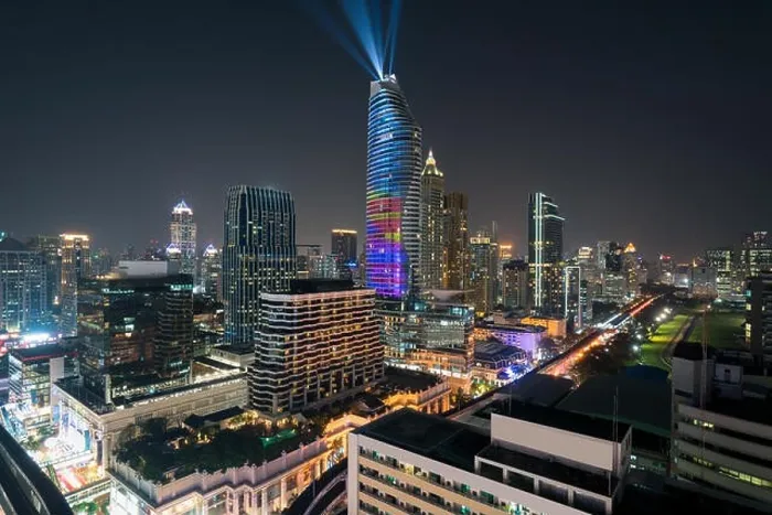 Framed Print : Night view with skyscraper in business district in Bangkok Thailand. Light show at Magnolias Ratchaprasong in Bangkok, Thailand Framed Print : Night view with skyscraper in business district in Bangkok Thailand. Light show at Magnolias Ratchaprasong in Bangkok, Thailand