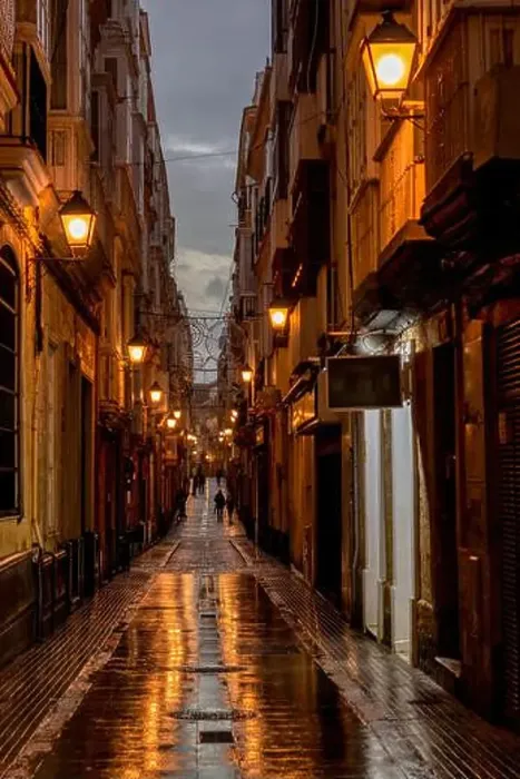 Framed Print : Night view of a typical street in the downtown of Cadiz, Andalusia, Spain Framed Print : Night view of a typical street in the downtown of Cadiz, Andalusia, Spain