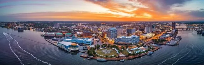 Framed Print : Norfolk, Virginia, USA downtown city skyline from over the Elizabeth River at dusk Framed Print : Norfolk, Virginia, USA downtown city skyline from over the Elizabeth River at dusk