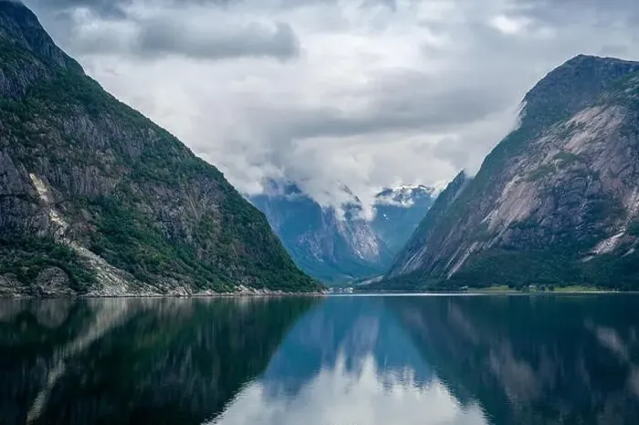 Framed Print : Norway fjord scenic landscape of Eidfjord with mountain reflections on the water Framed Print : Norway fjord scenic landscape of Eidfjord with mountain reflections on the water