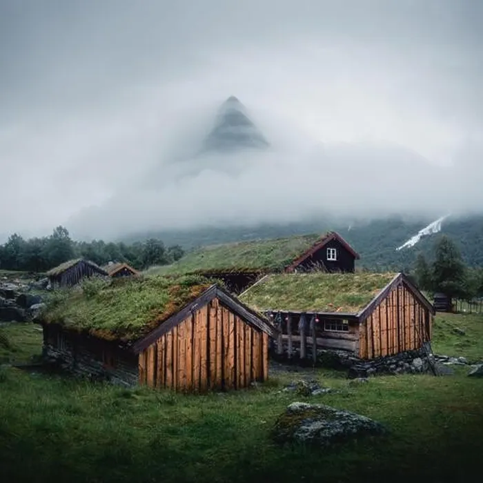 Framed Print : Norwegian old wooden fishing houses with grass roofs in Innerdalen - Norway's most beautiful mountains valley, near Innerdalsvatna lake Framed Print : Norwegian old wooden fishing houses with grass roofs in Innerdalen - Norway's most beautiful mountains valley, near Innerdalsvatna lake