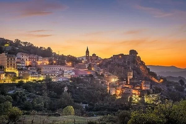 Novara di Sicilia, Italy village skyline on the island of Sicily at dusk