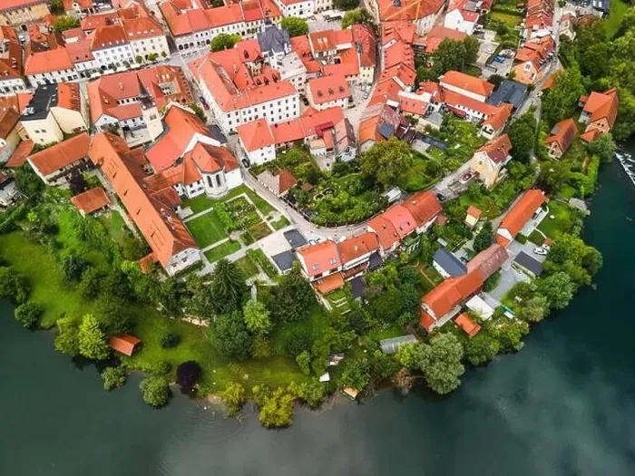 Framed Print : Novo Mesto Cityscape at Bend of the Krka River in Slovenia Lower Carniola Region. Aerial Drone View Framed Print : Novo Mesto Cityscape at Bend of the Krka River in Slovenia Lower Carniola Region. Aerial Drone View