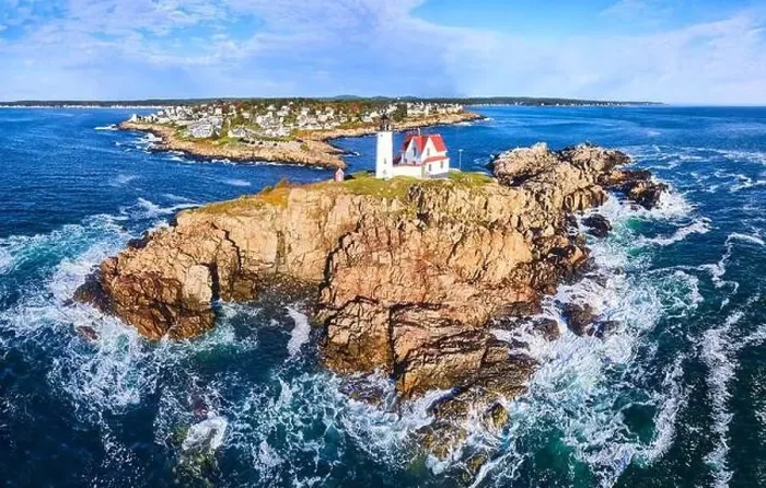 Framed Print : Nubble Lighthouse island off of Maine coast with ocean waves Framed Print : Nubble Lighthouse island off of Maine coast with ocean waves